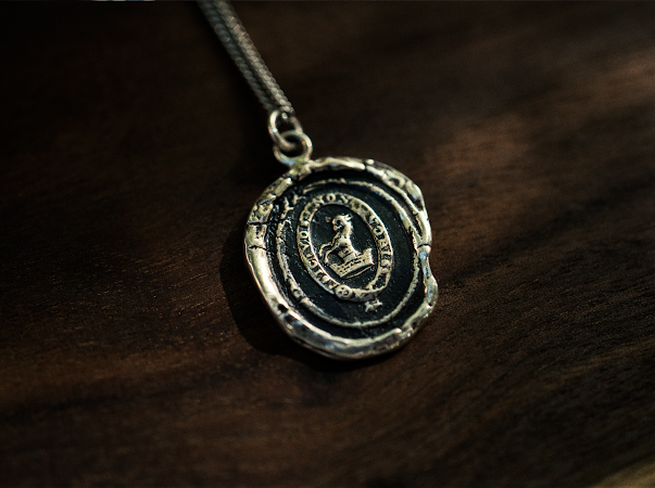 Devoted Father’s Silver Talisman - Pyrrha