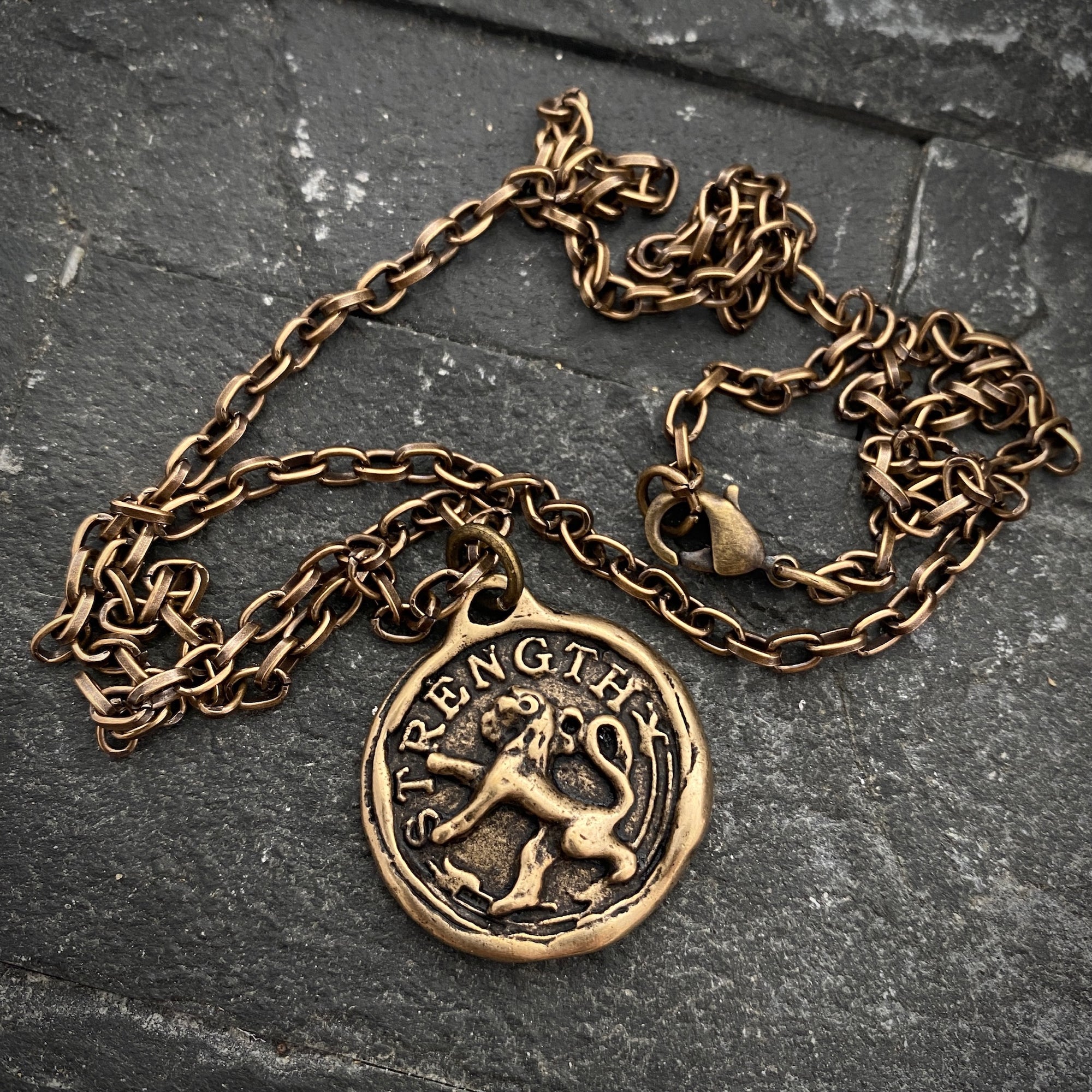 “Strength” Bronze Lion Pendant