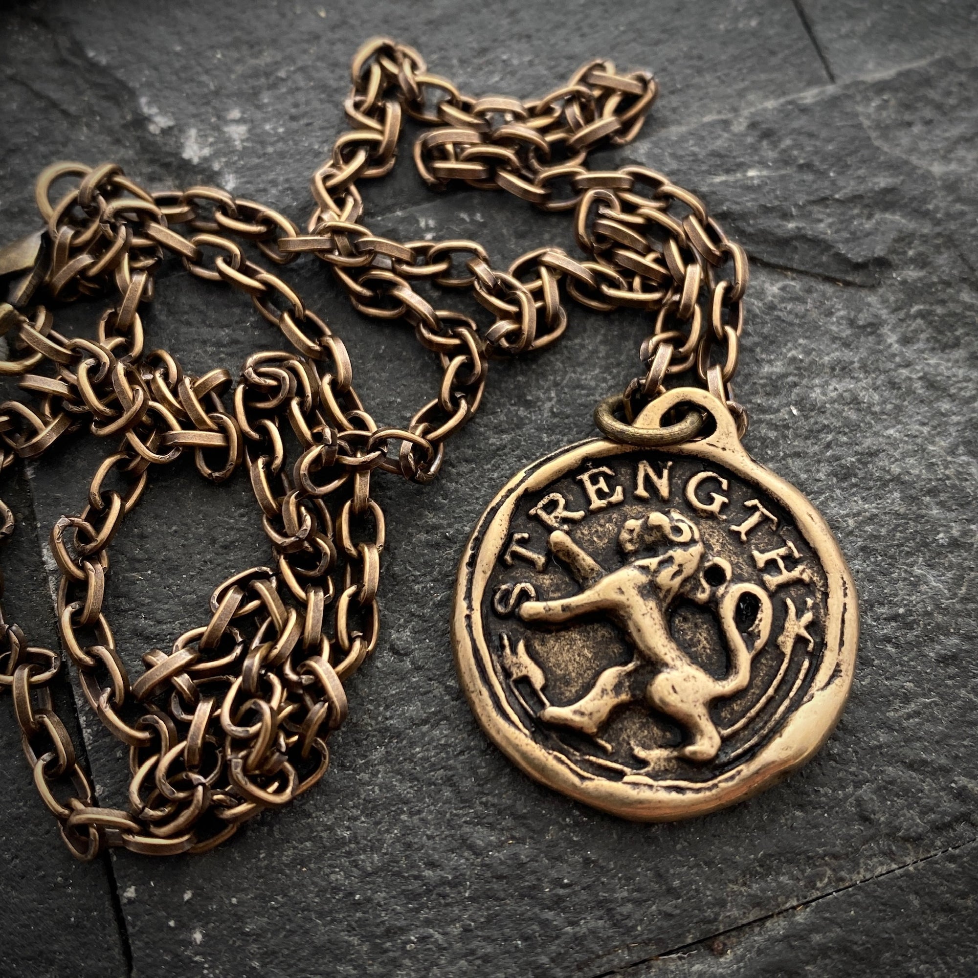 “Strength” Bronze Lion Pendant